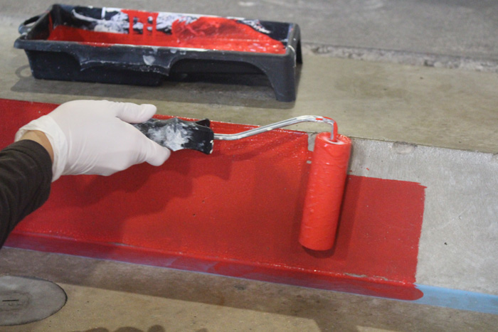 FCK-Fans in Aktion, mit Pinsel, Rolle und Farbe